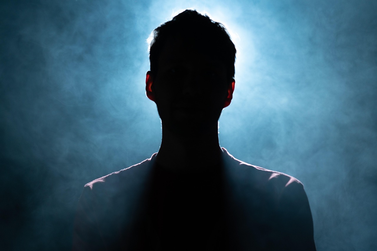 Companies House ID verification A man's silhouette is seen in the shadows